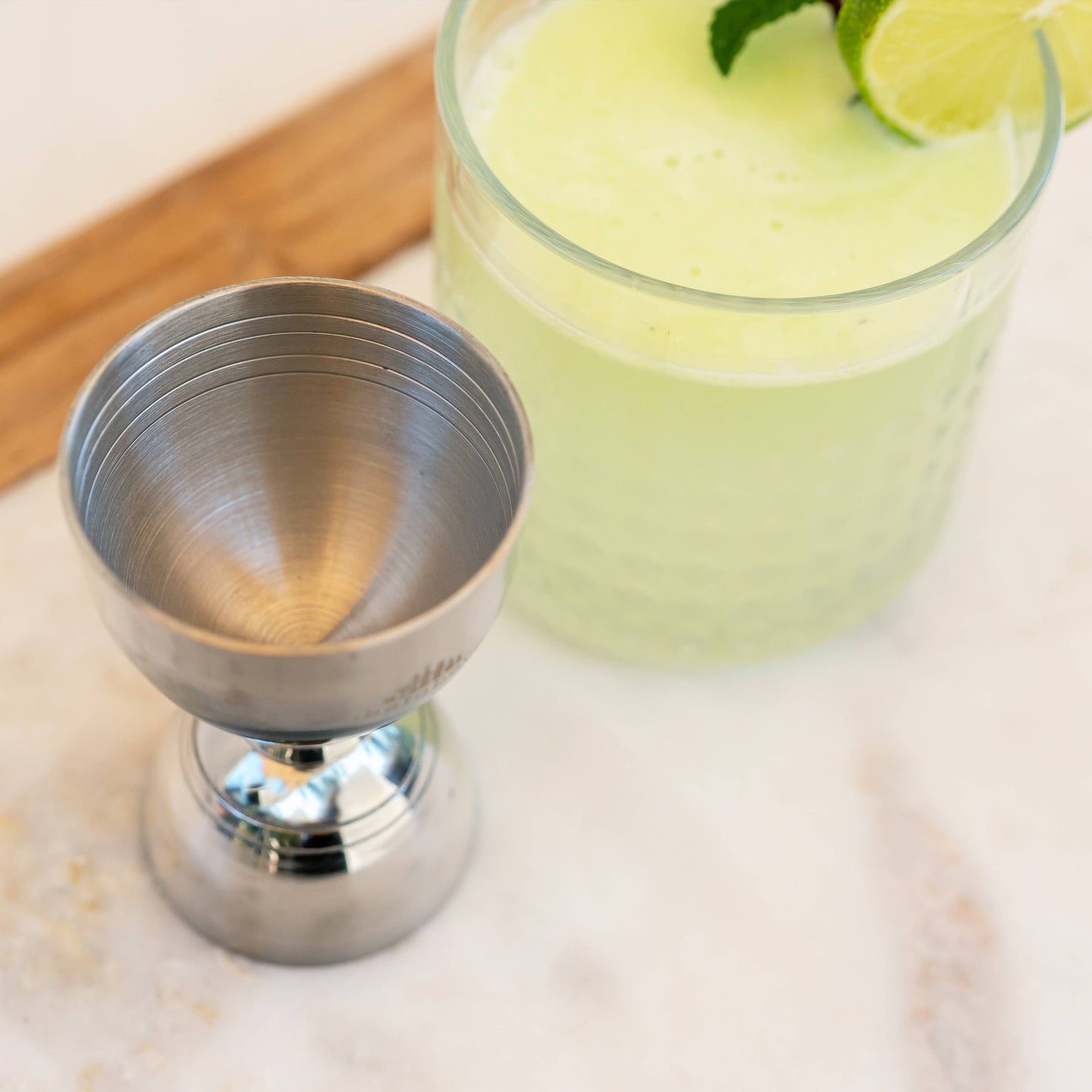 A Bar Above Stainless Steel Bell Jigger