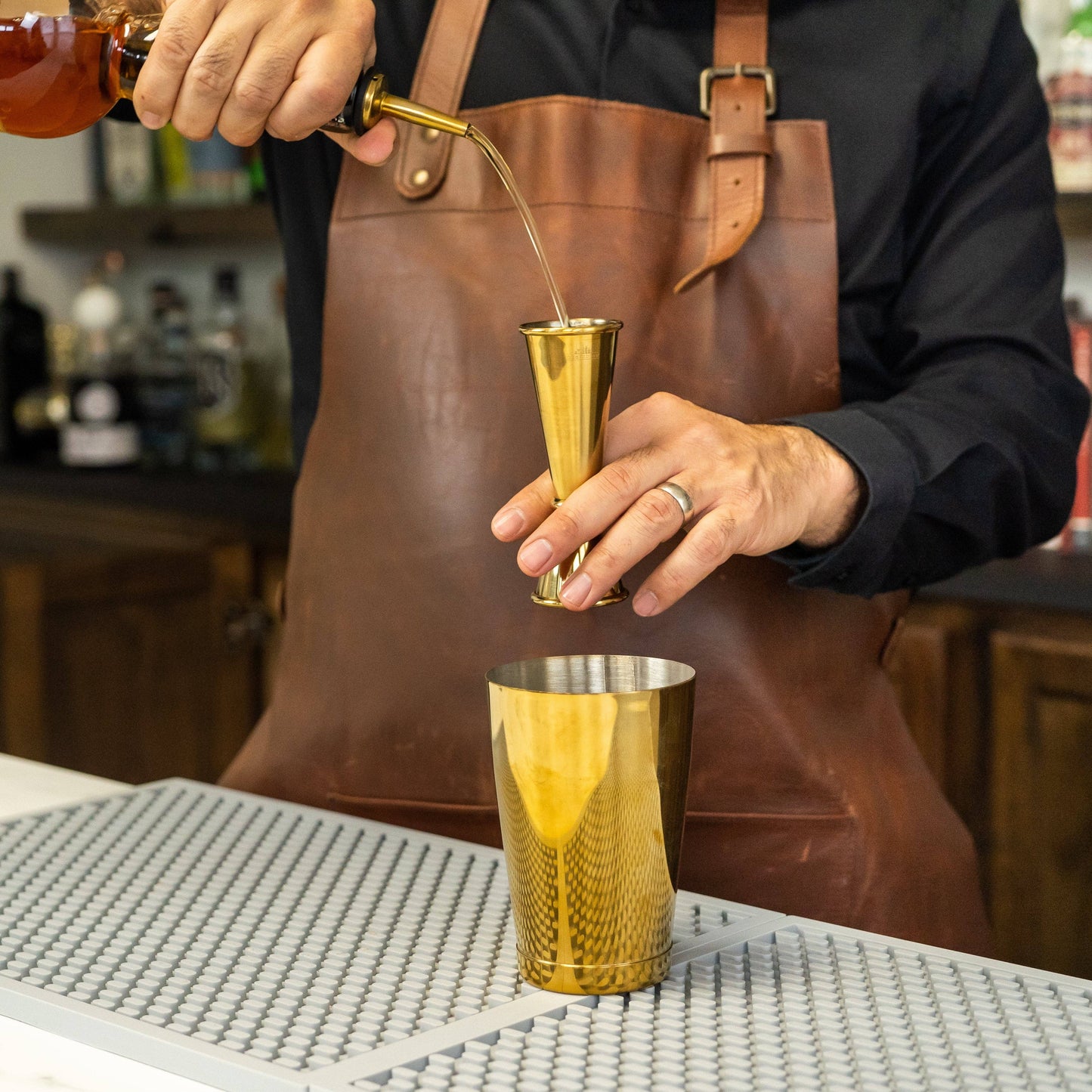 A Bar Above Black Pour Spouts